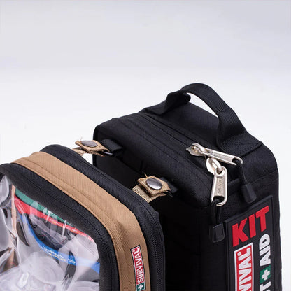Remote and Outdoor module clipped onto a red SURVIVAL first aid case