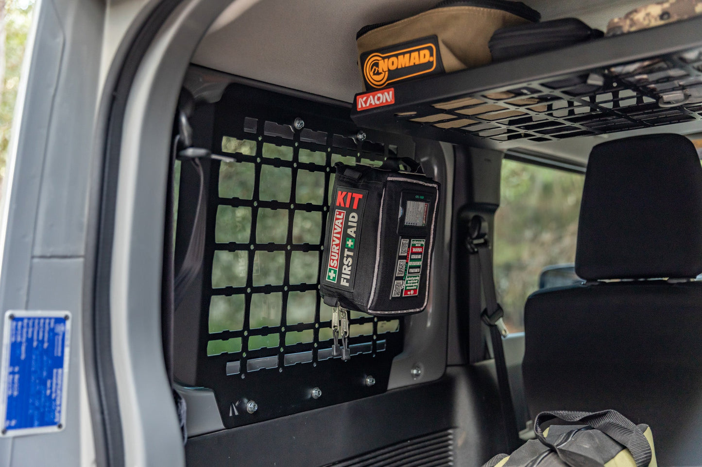 Vehicle case mounted in the back of a 4x4 behind the rear seats