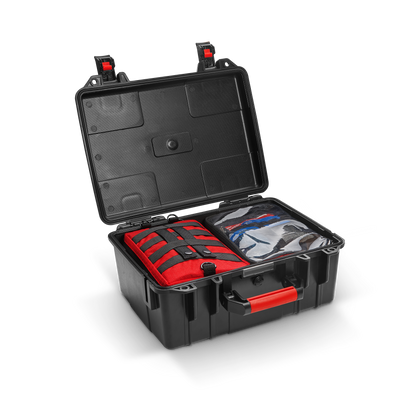 Open waterproof transport box with the red first aid case packed inside