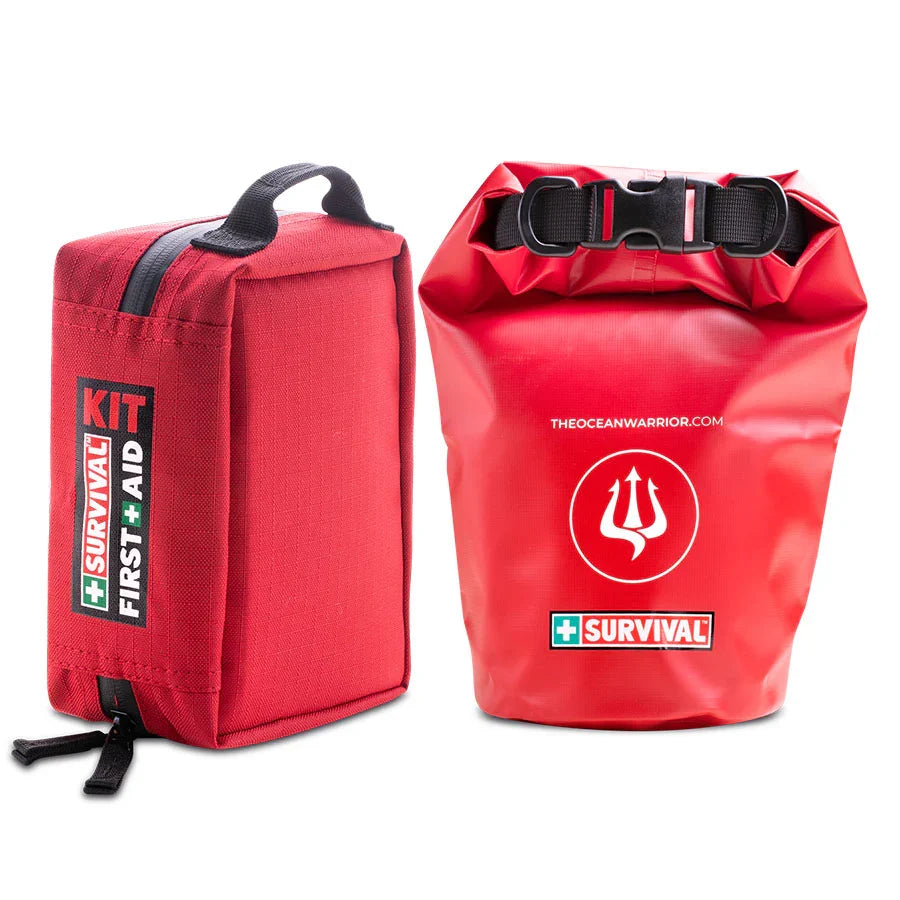 Red Ocean Warrior first aid case next to the red waterproof dry bag